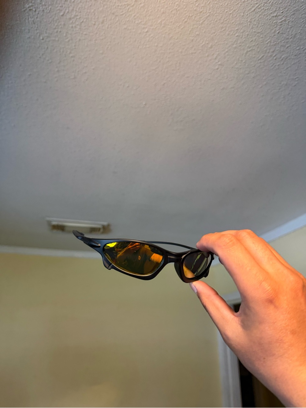 Sporty Black Sunglasses with Amber Lenses Oakley Oakleys